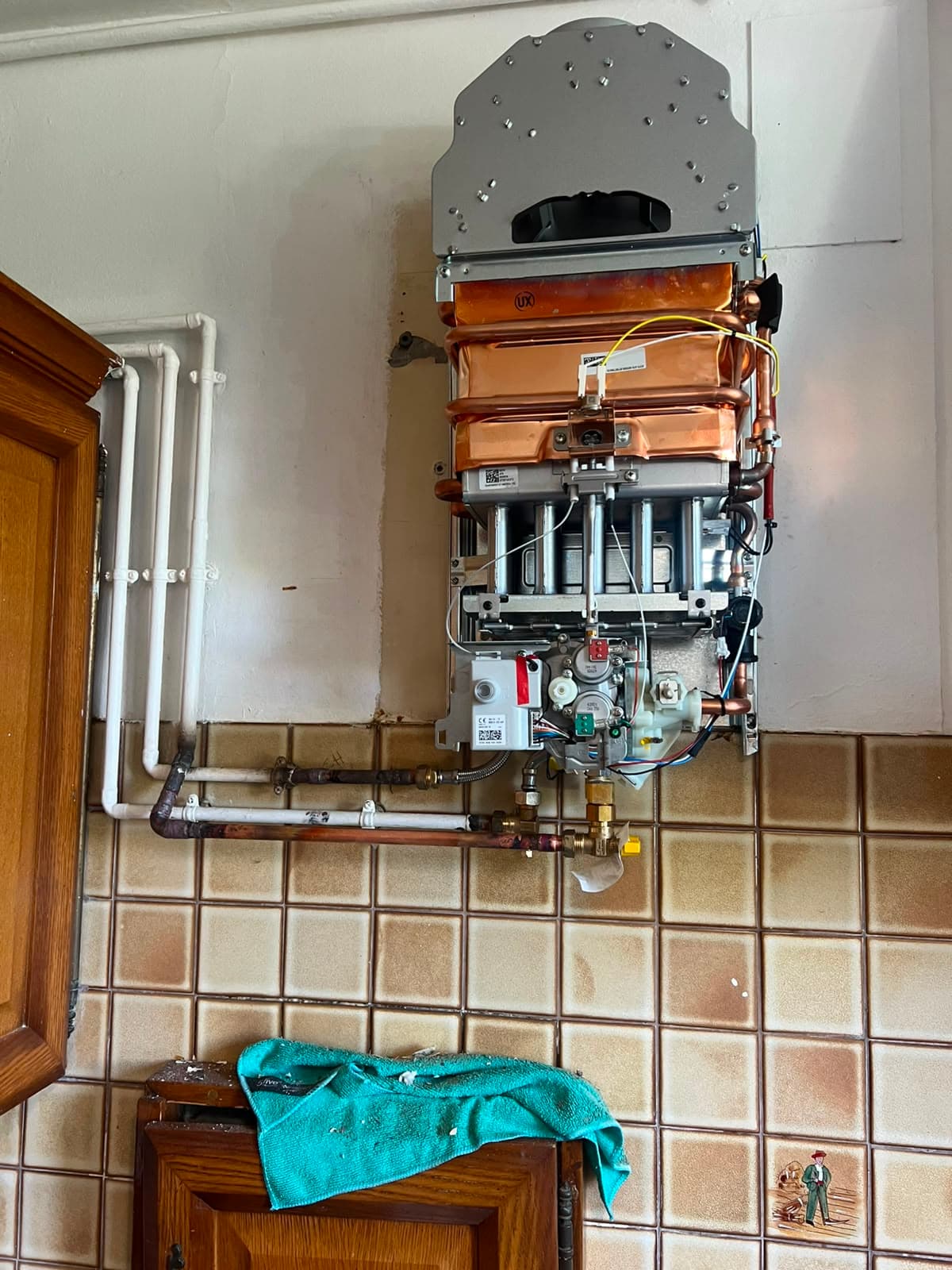 Dépannage d'un chauffe-eau gaz ouvert pour entretien